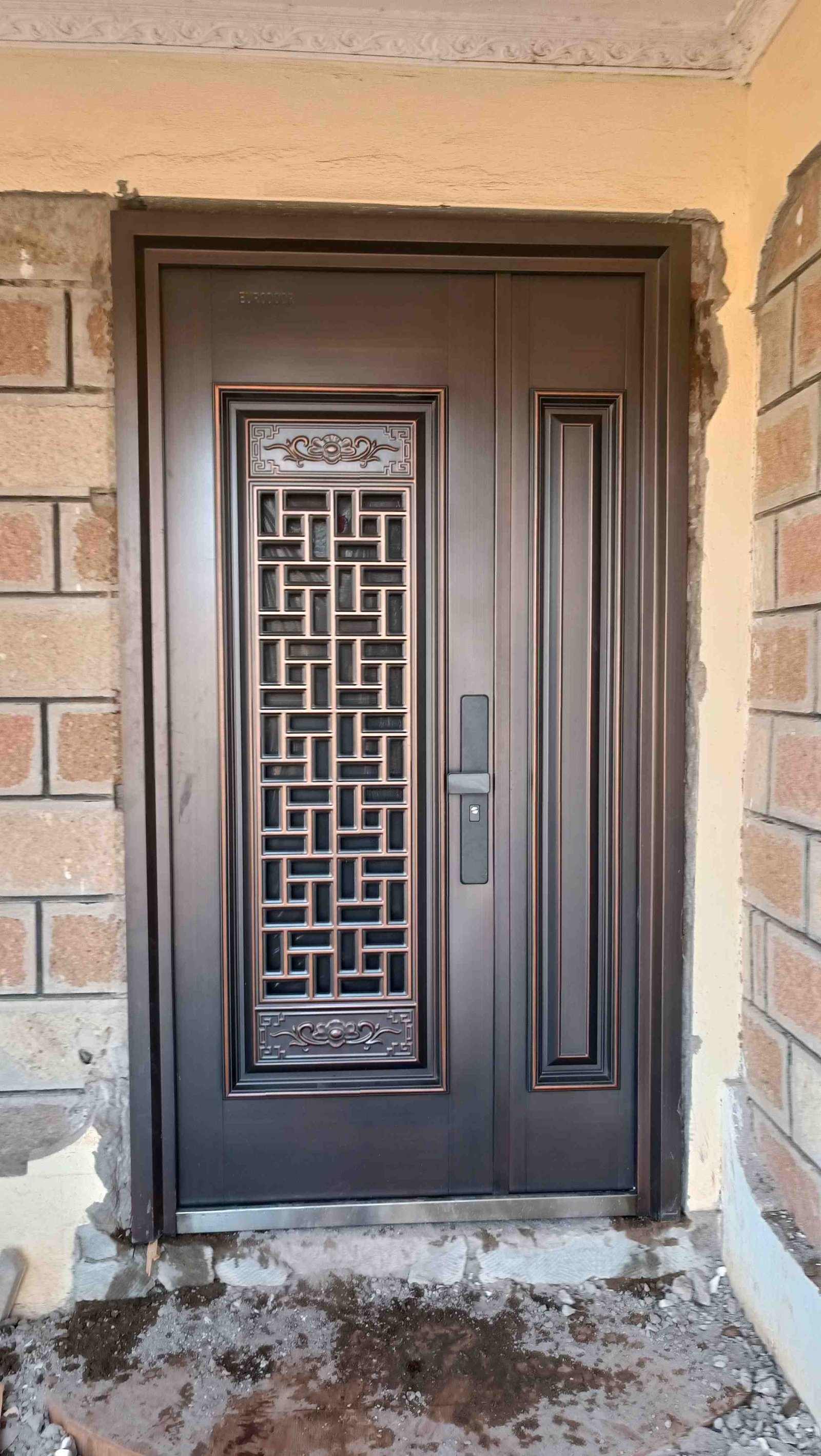 African walnut brown steel security door installed