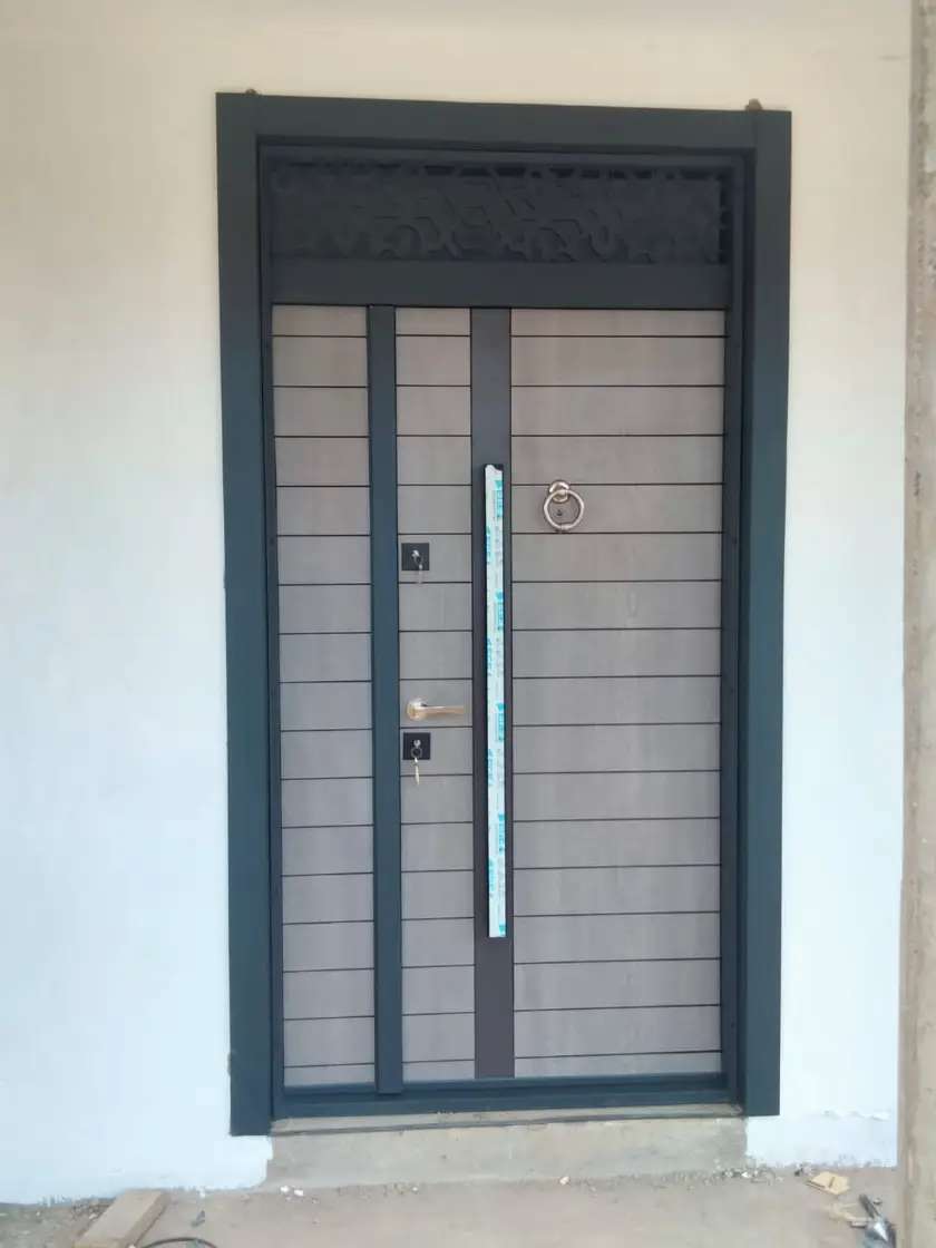 double matte grey wood coated Euro Door  steel door installed in Siaya County 