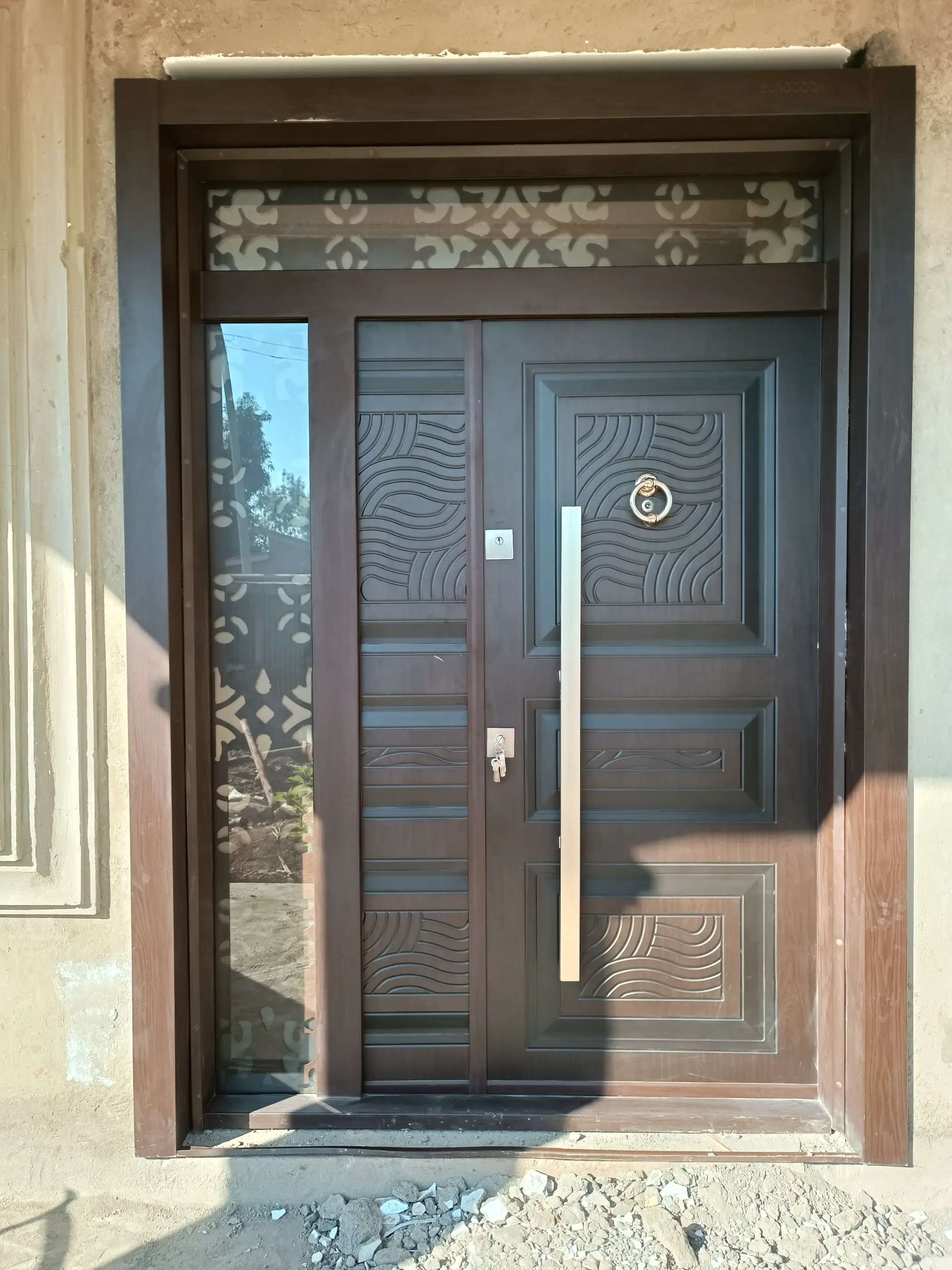 steel door with glass and grill on both sides